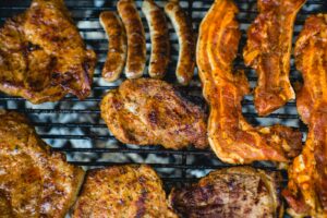 top view photo of grilling chicken and bacon