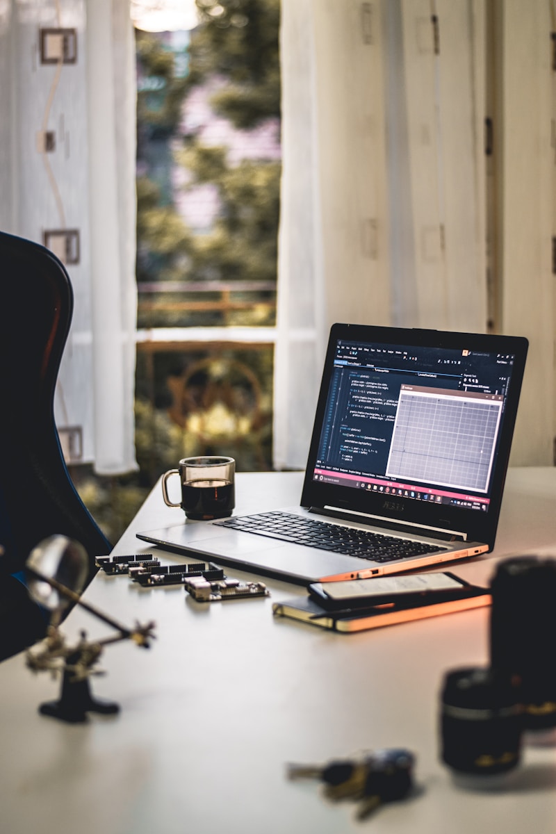 MacBook Pro on white table